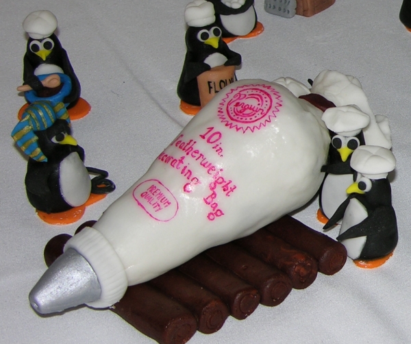 Penguins Making a Cake