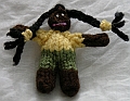 Black, Khaki Shorts, Yellow T-Shirt, Long Black Braids