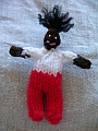 Black, Red Pants, White Shirt, Fuzzy Black Hair